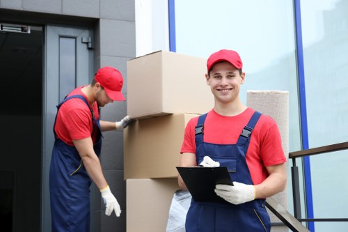 Professional movers working in an Islington property