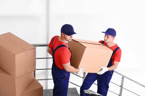 Office removal planning in Islington with moving boxes and workspace setup