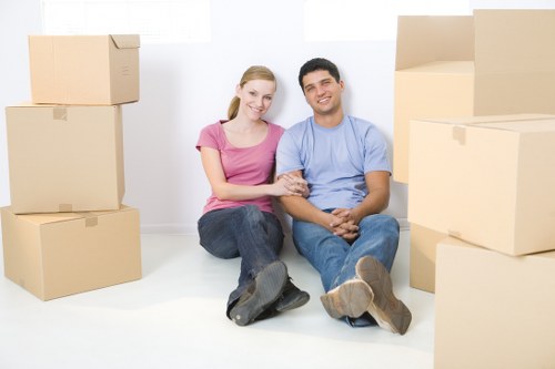 Moving van and packed boxes outside an Islington flat