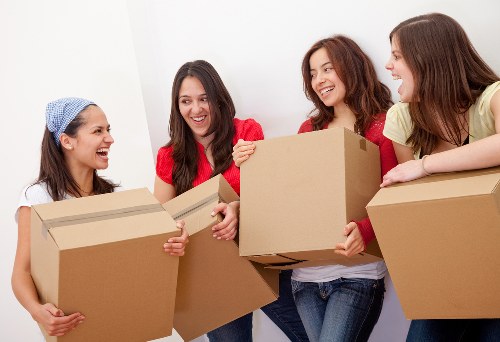 Careful packing and labeling for a house move in Islington