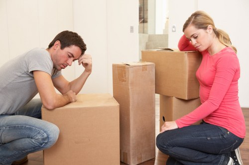 Local removal team carrying furniture in Islington