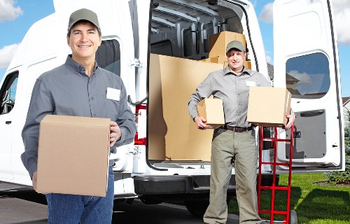 Packed moving boxes and furniture prepared for removals in Islington