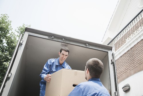 Professional movers handling boxes during an Islington relocation