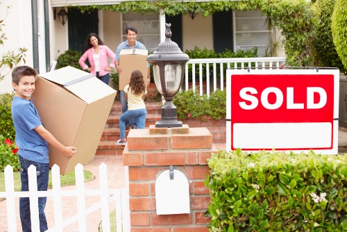 Professional movers handling furniture during a home removal